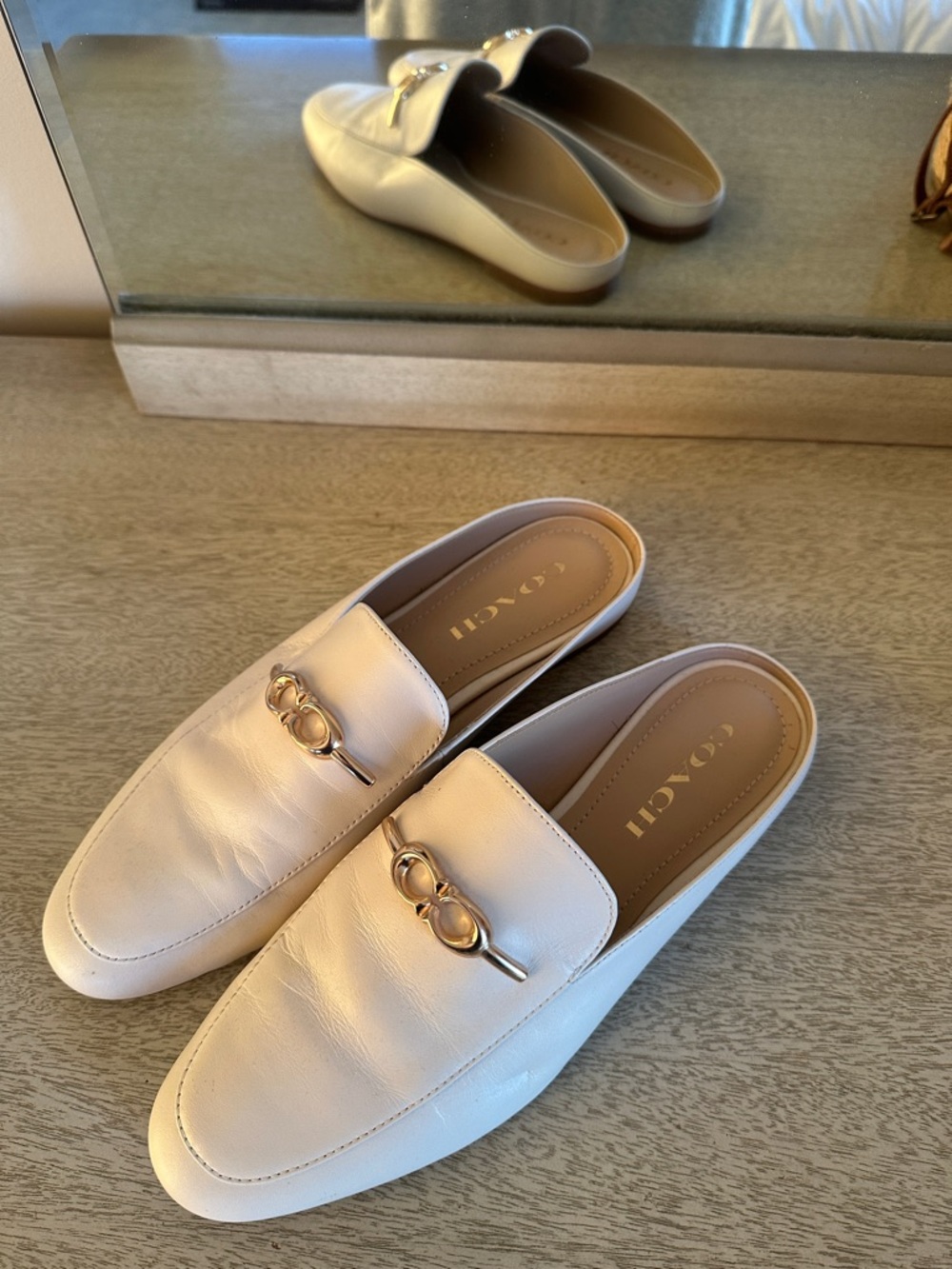 Coach Cream Leather Backless Mules with Gold Chain Accent